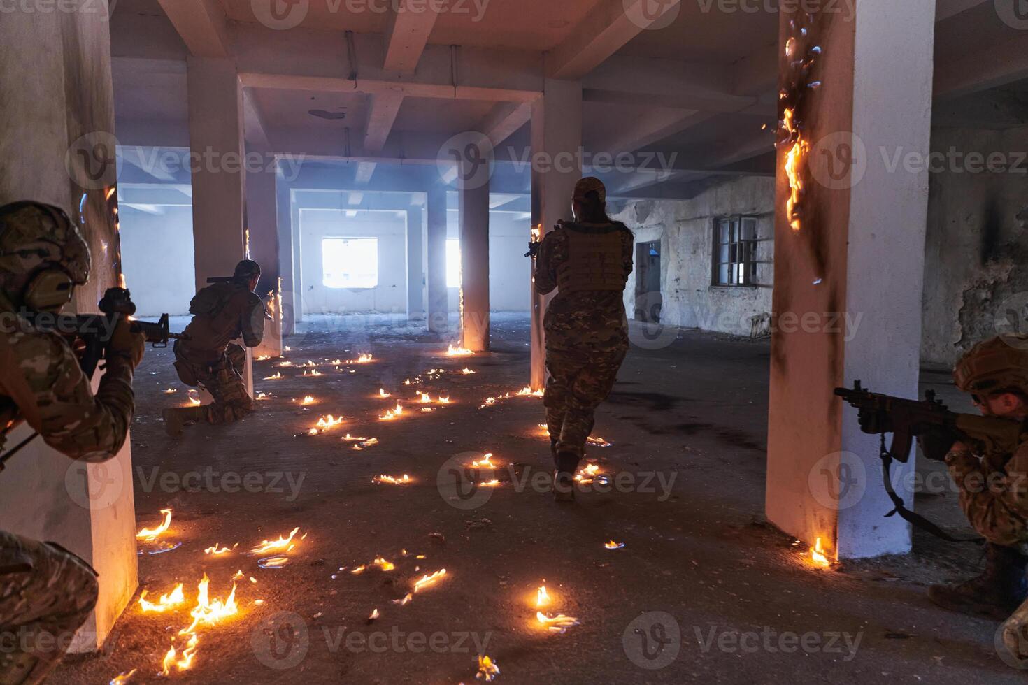 A group of professional soldiers bravely executes a dangerous rescue mission, surrounded by fire in a perilous building. photo