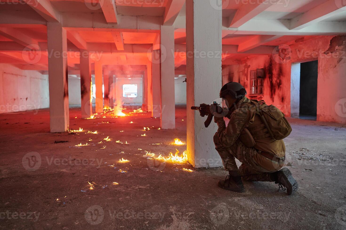 A group of professional soldiers bravely executes a dangerous rescue mission, surrounded by fire in a perilous building. photo