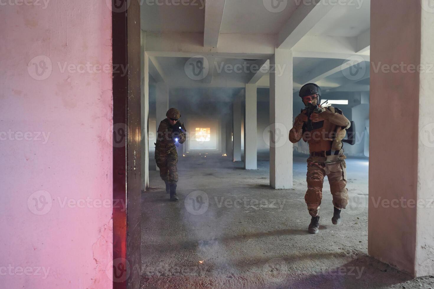 A group of professional soldiers bravely executes a dangerous rescue mission, surrounded by fire in a perilous building. photo