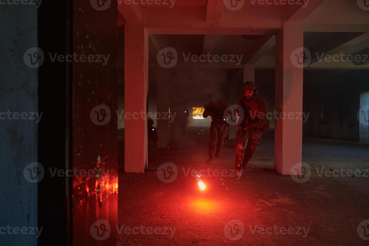 A group of professional soldiers bravely executes a dangerous rescue mission, surrounded by fire in a perilous building. photo