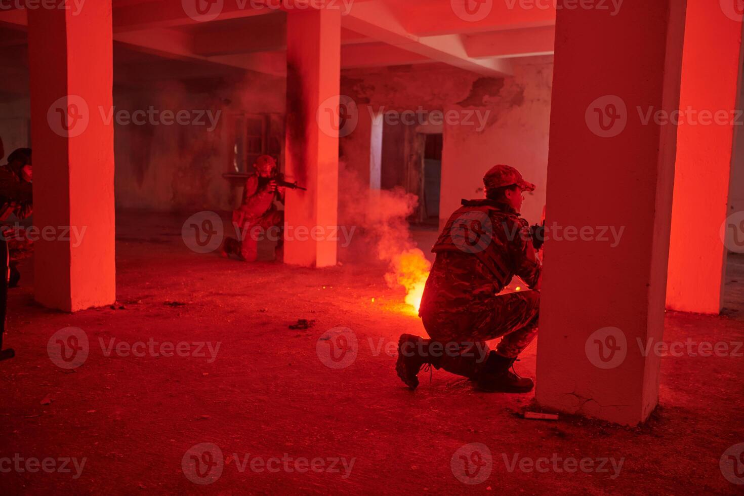 A group of professional soldiers bravely executes a dangerous rescue mission, surrounded by fire in a perilous building. photo