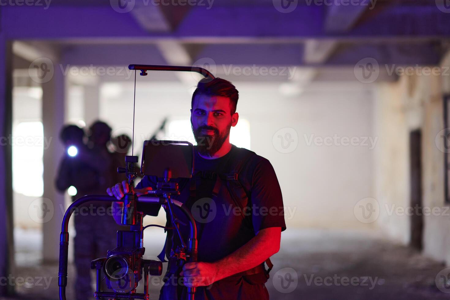 A professional cameraman captures the intense moments as a group of skilled soldiers embarks on a dangerous mission inside an abandoned building, their actions filled with suspense and bravery photo