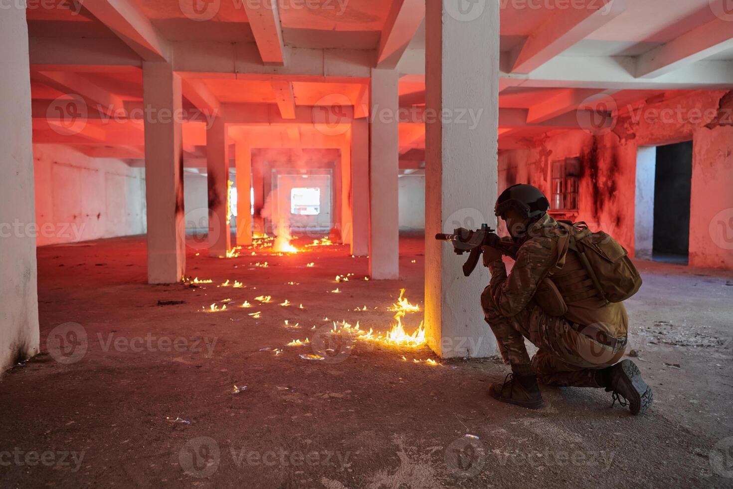 A group of professional soldiers bravely executes a dangerous rescue mission, surrounded by fire in a perilous building. photo