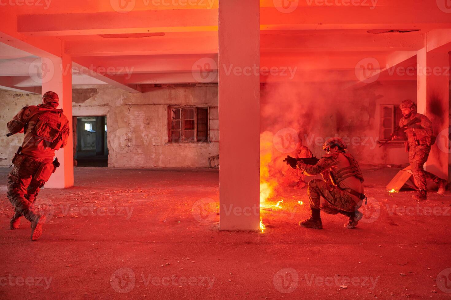A group of professional soldiers bravely executes a dangerous rescue mission, surrounded by fire in a perilous building. photo