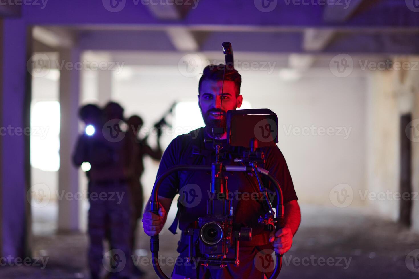 A professional cameraman captures the intense moments as a group of skilled soldiers embarks on a dangerous mission inside an abandoned building, their actions filled with suspense and bravery photo