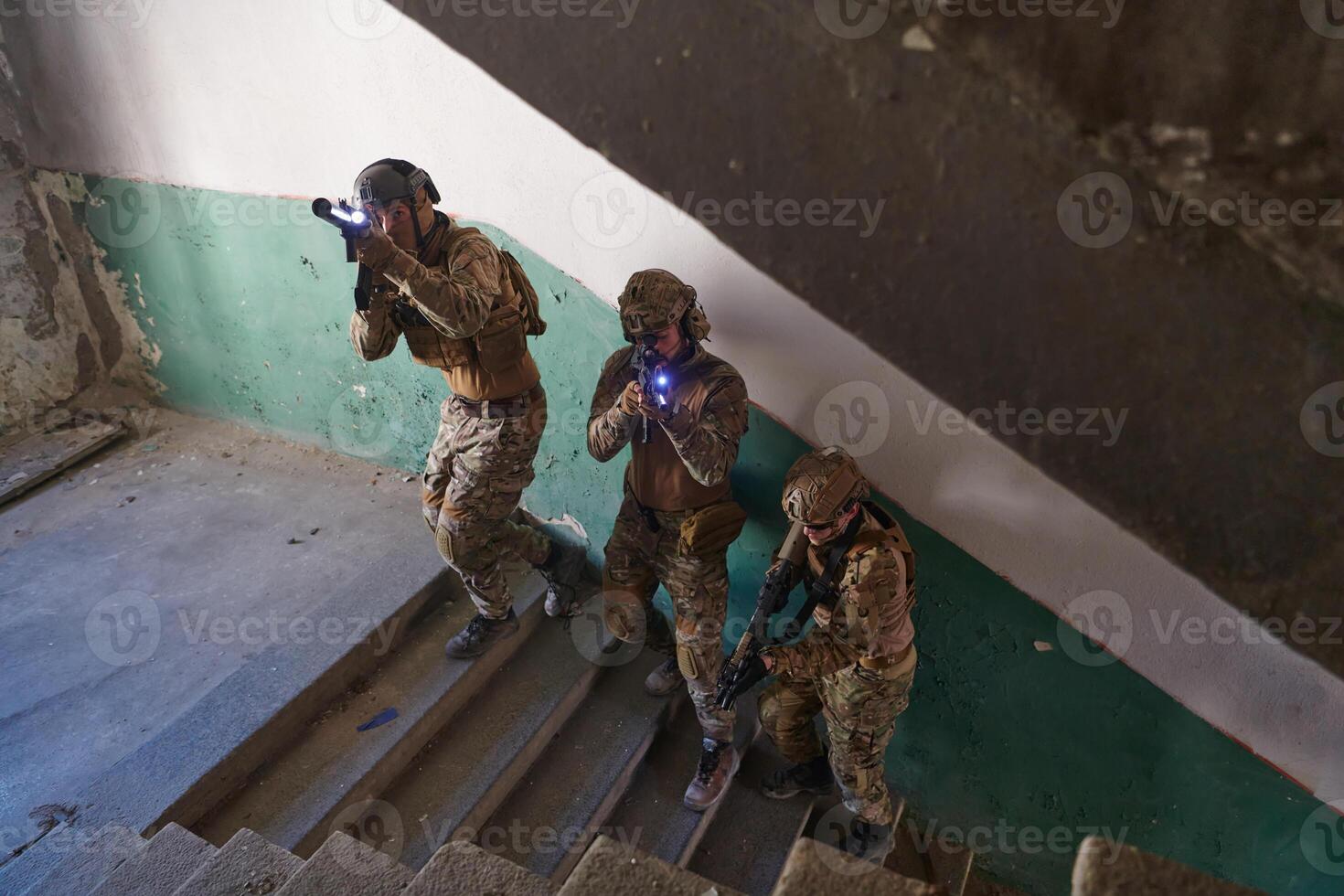 A group of professional soldiers bravely executes a dangerous rescue mission, surrounded by fire in a perilous building. photo