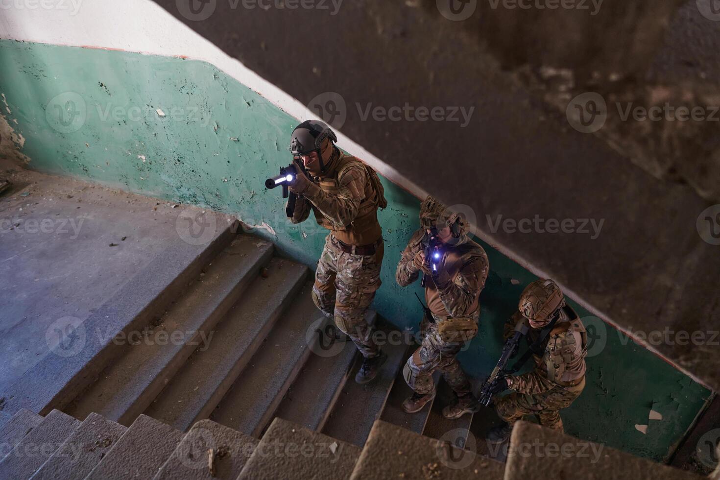 A group of professional soldiers bravely executes a dangerous rescue mission, surrounded by fire in a perilous building. photo