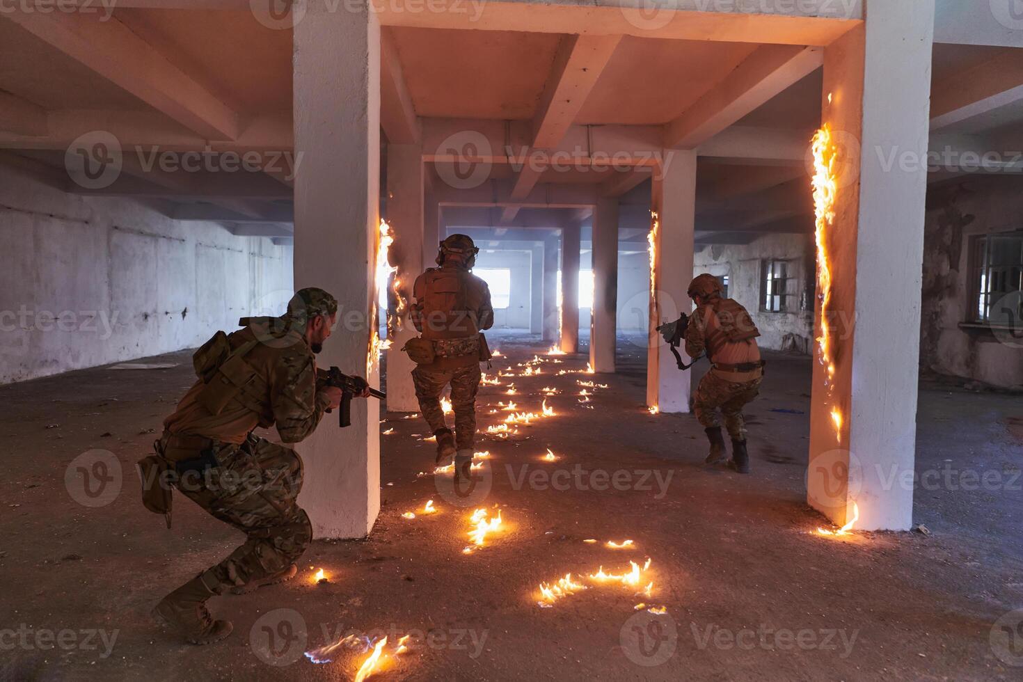 A group of professional soldiers bravely executes a dangerous rescue mission, surrounded by fire in a perilous building. photo