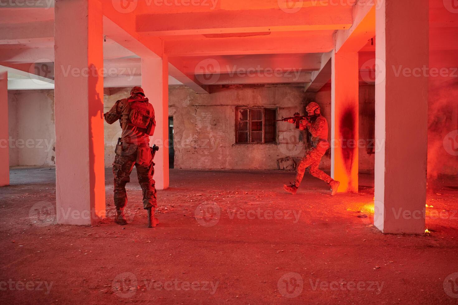 A group of professional soldiers bravely executes a dangerous rescue mission, surrounded by fire in a perilous building. photo