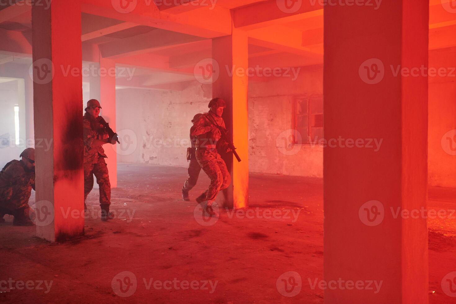 A group of professional soldiers bravely executes a dangerous rescue mission, surrounded by fire in a perilous building. photo