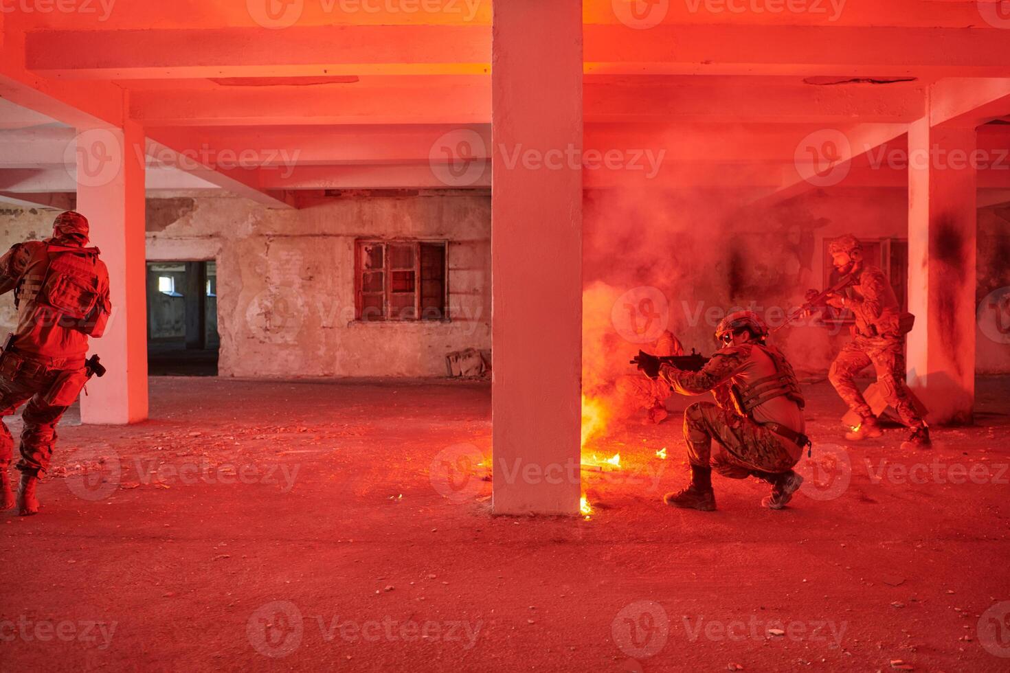 A group of professional soldiers bravely executes a dangerous rescue mission, surrounded by fire in a perilous building. photo