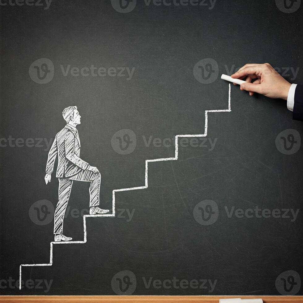 Businessman climbing up stairs to success concept photo