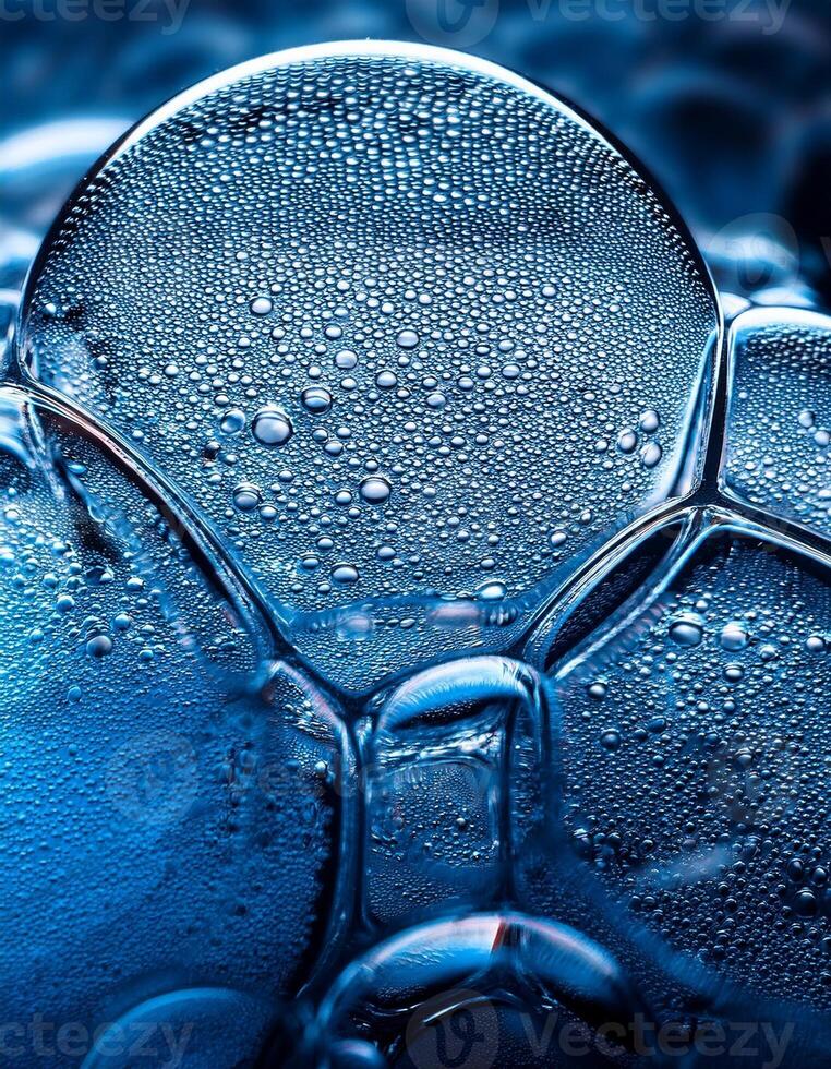 Bubbles and Droplets Create a Mesmerizing Pattern in Vibrant Blue Liquid photo