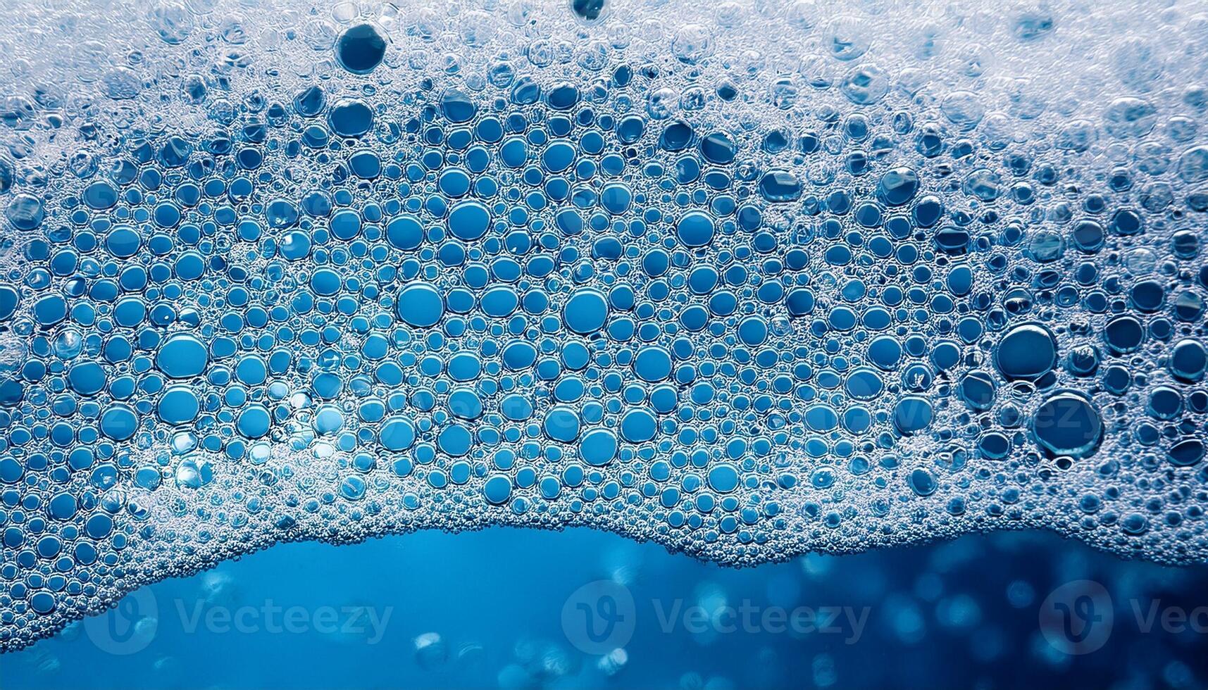 Bubbles Floating on a Surface of Blue Liquid Create a Captivating Visual Effect in a Close-Up View photo