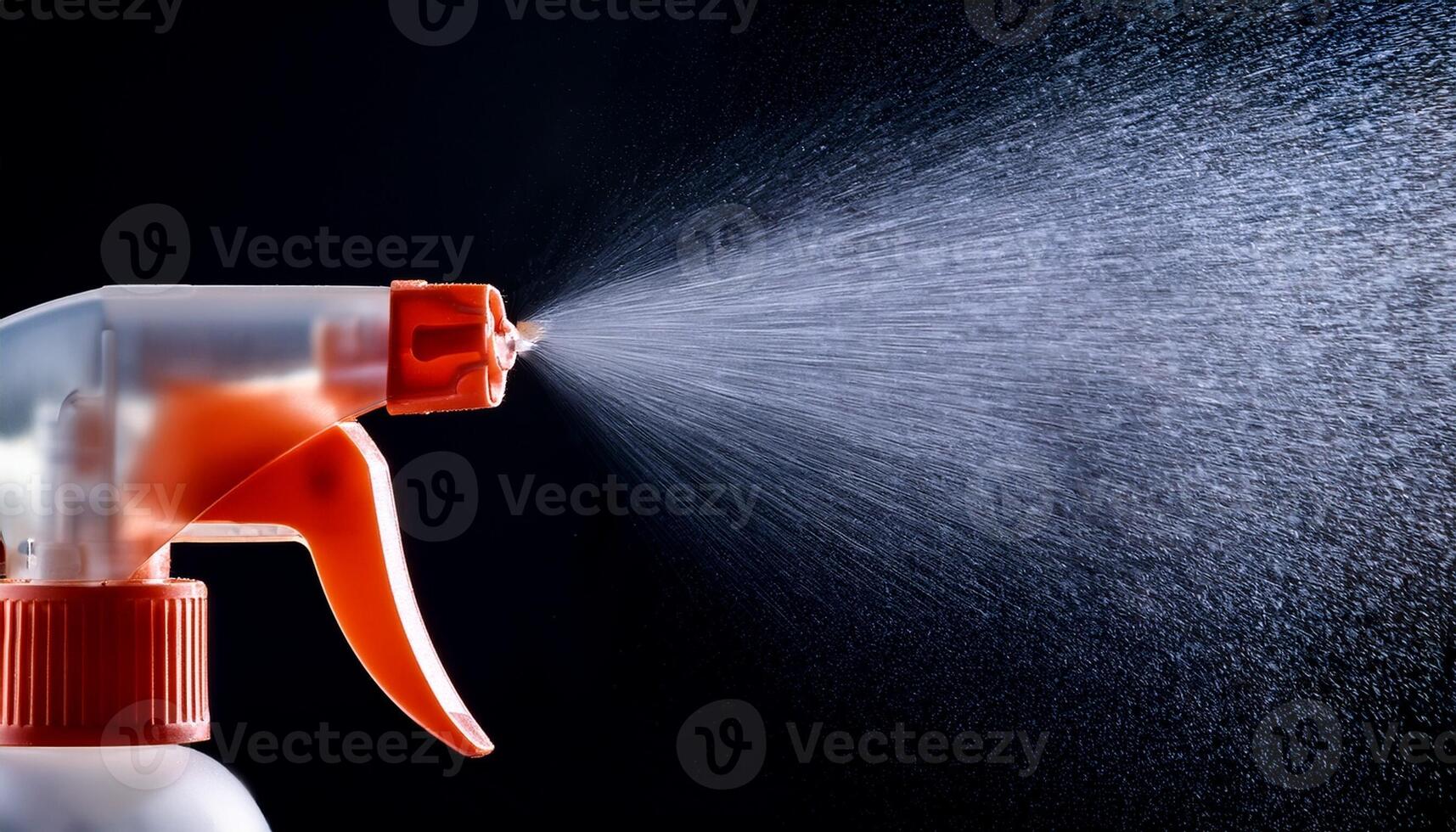 Water Spray Nozzle Releases Mist in Close-Up Against a Dark Background, Showcasing Fine Droplets in a Dynamic Spray Pattern photo
