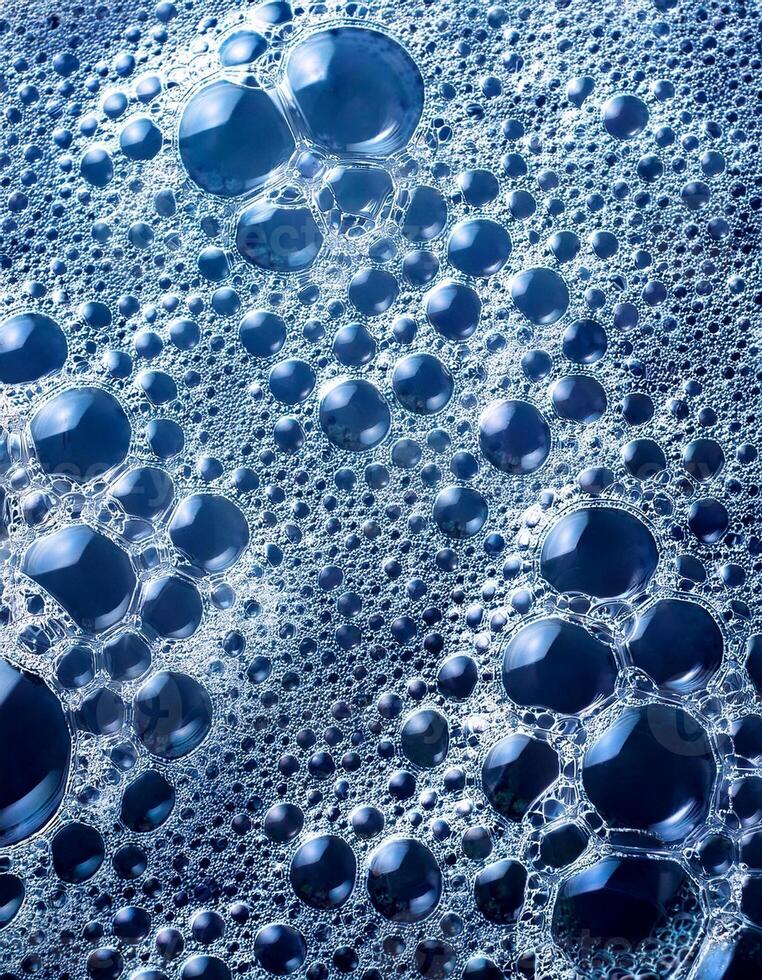 Close-up of Blue Bubbles Creating Intricate Patterns in Liquid photo