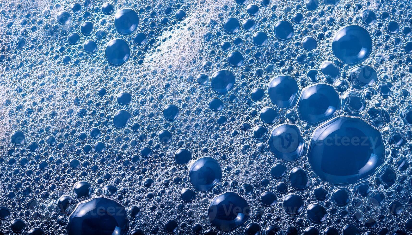 Colorful Blue Bubbles Create Interesting Patterns on a Surface of Foam at a Close Range During a Bright Moment photo