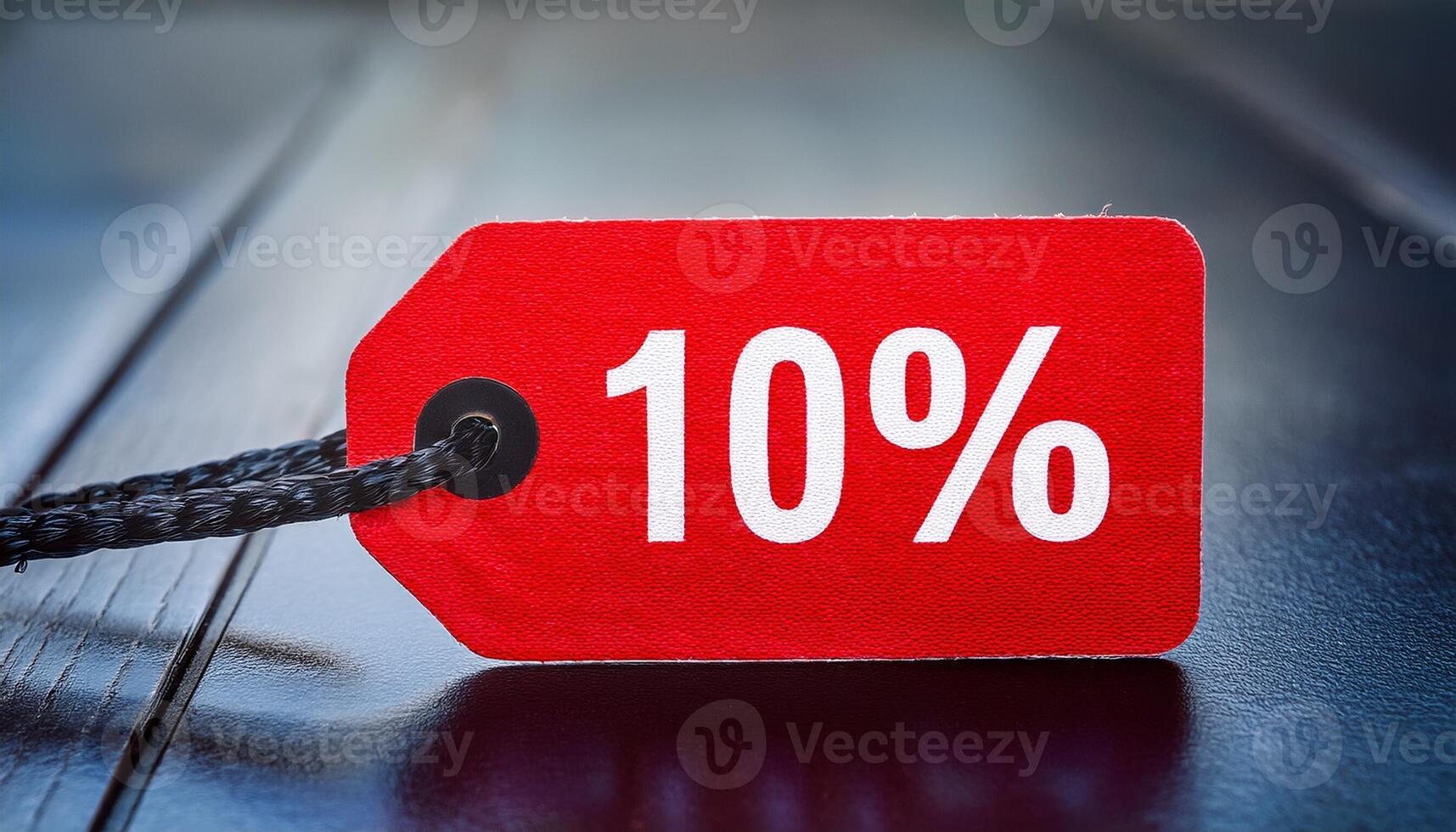 Discount Tag Showing 10 Percent off on a Wooden Surface for Promotional Sales in a Retail Store photo