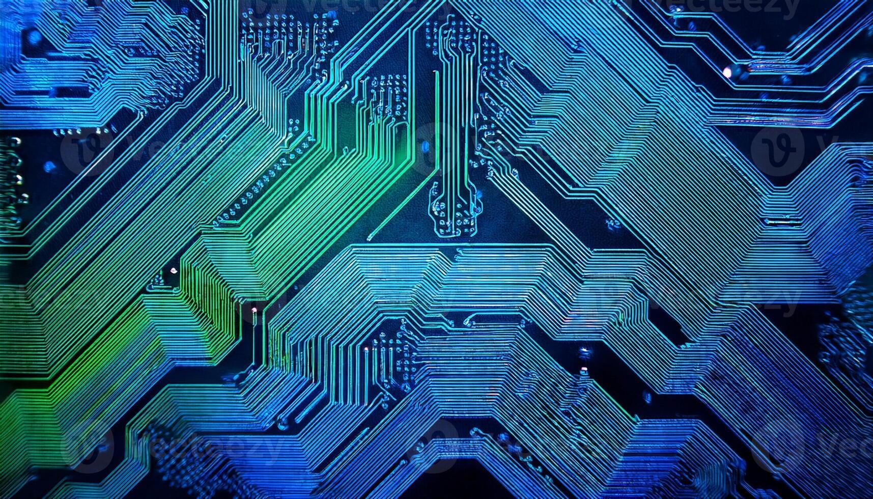 Circuit Board Patterns Illuminated in Vibrant Blue and Green Hues Showcasing Intricate Designs and Technology photo