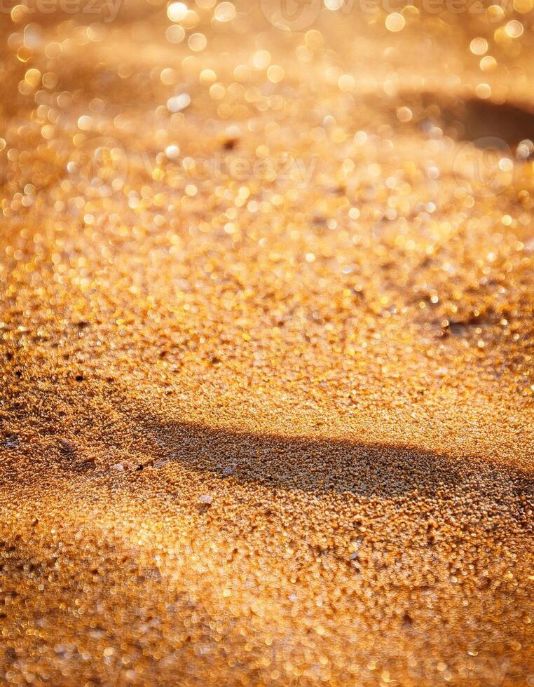 Soft Golden Sand Glistens Under Sunlight at a Tranquil Beach in the Early Evening photo