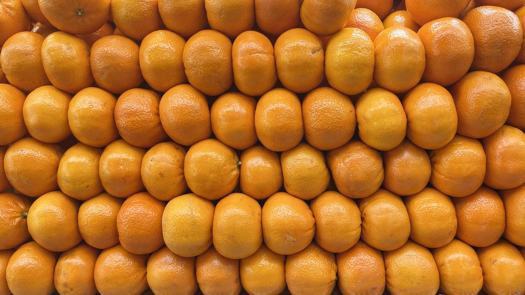 Pile of oranges in market photo