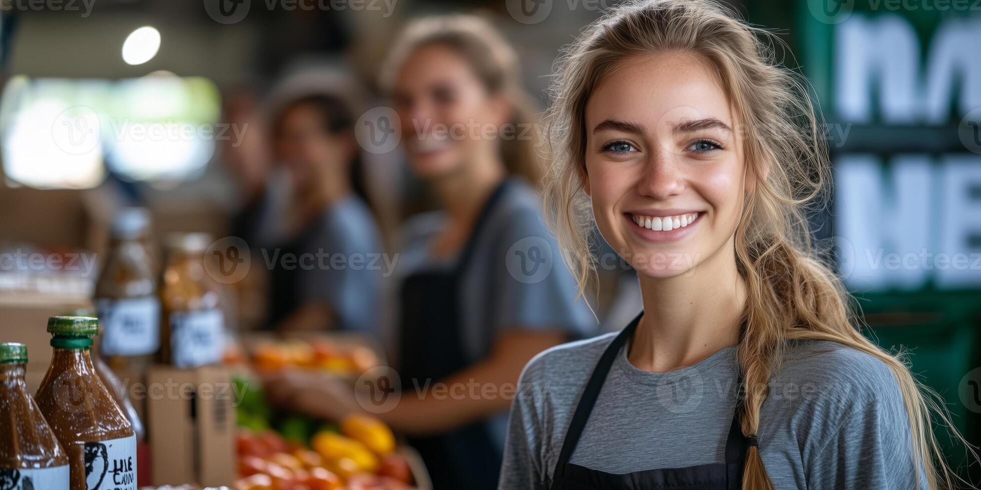 a female leader organizing a food drive, standing beside tables filled with donations, smiling while coordinating with other volunteers, with a clean right side for promotional use photo