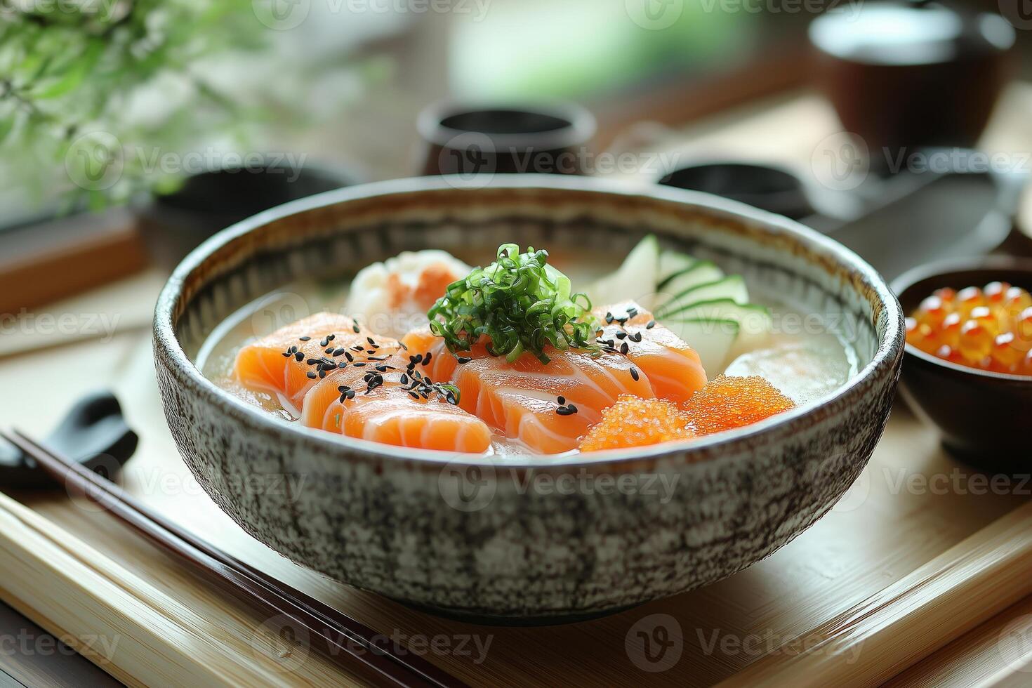 a Japanese kaiseki meal, featuring small, elegantly arranged dishes of sushi, tempura, and miso soup photo