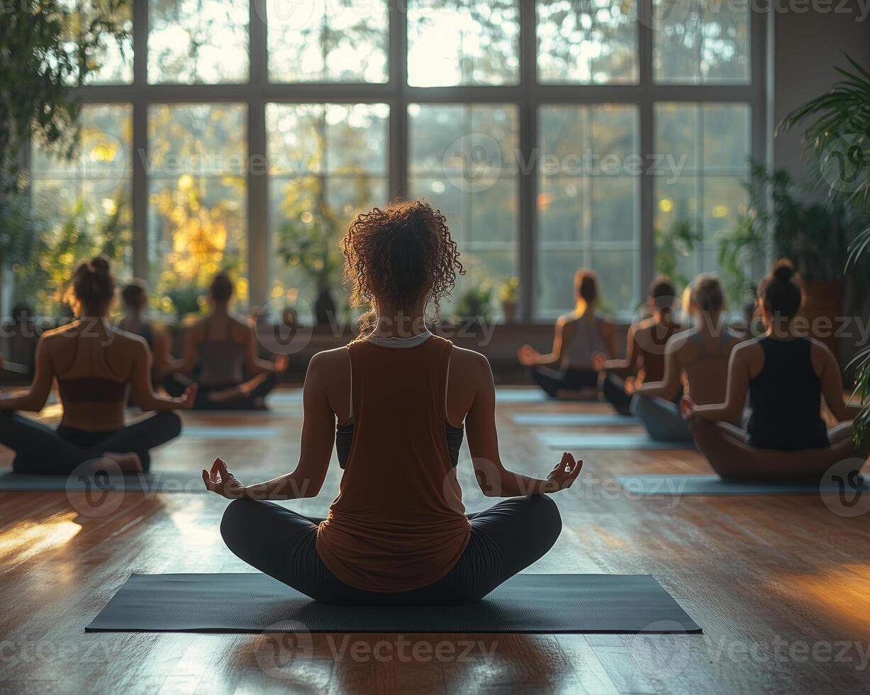 a group yoga class featuring people with various disabilities, a supportive instructor guiding them, cozy studio with natural lighting and calming decor photo