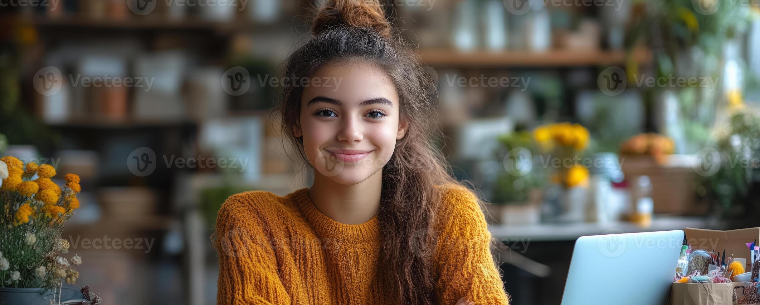 a teenage entrepreneur selling handmade crafts online, sitting at a desk with a laptop, colorful products, and packaging materials, leaving space on the right for promotional use photo