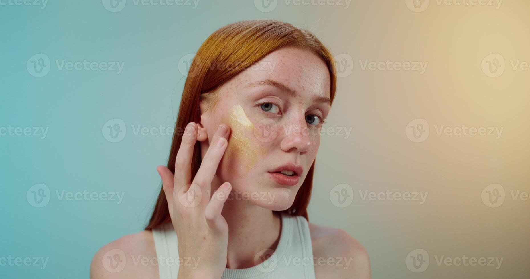 A woman with a cream on her face photo