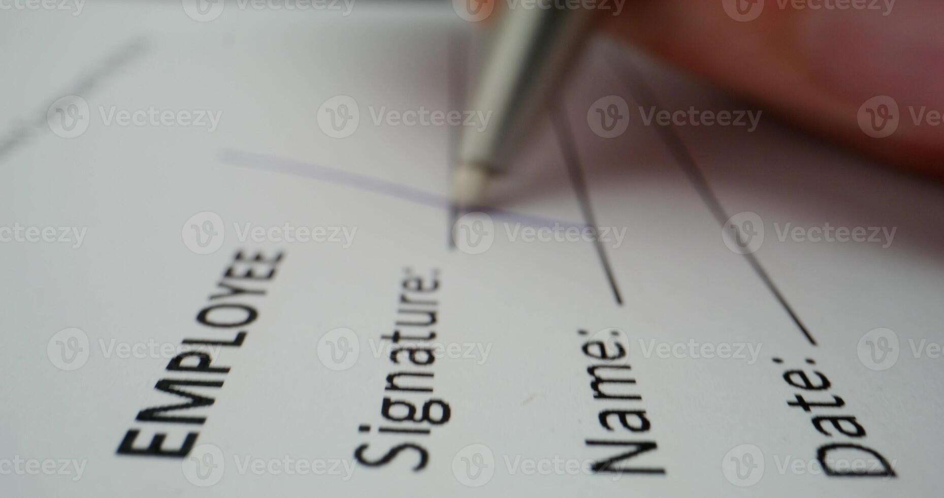 Employee signature on a paper photo