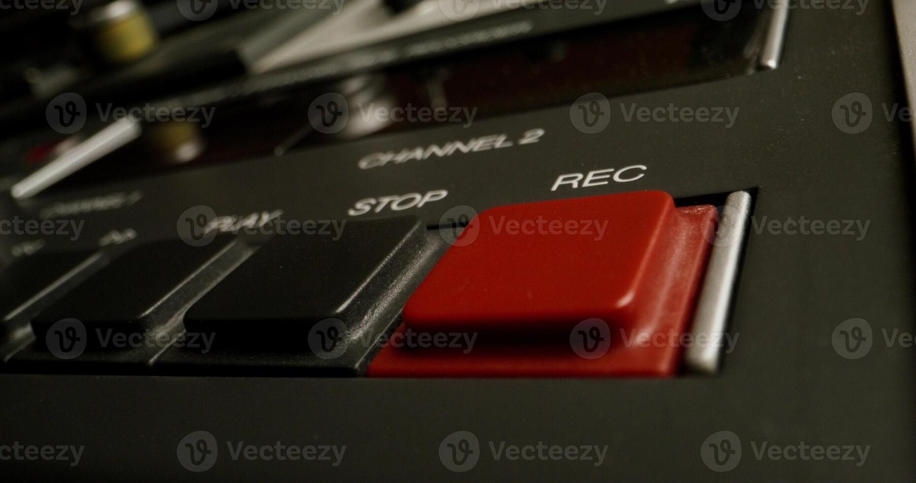 The man presses the rec button photo