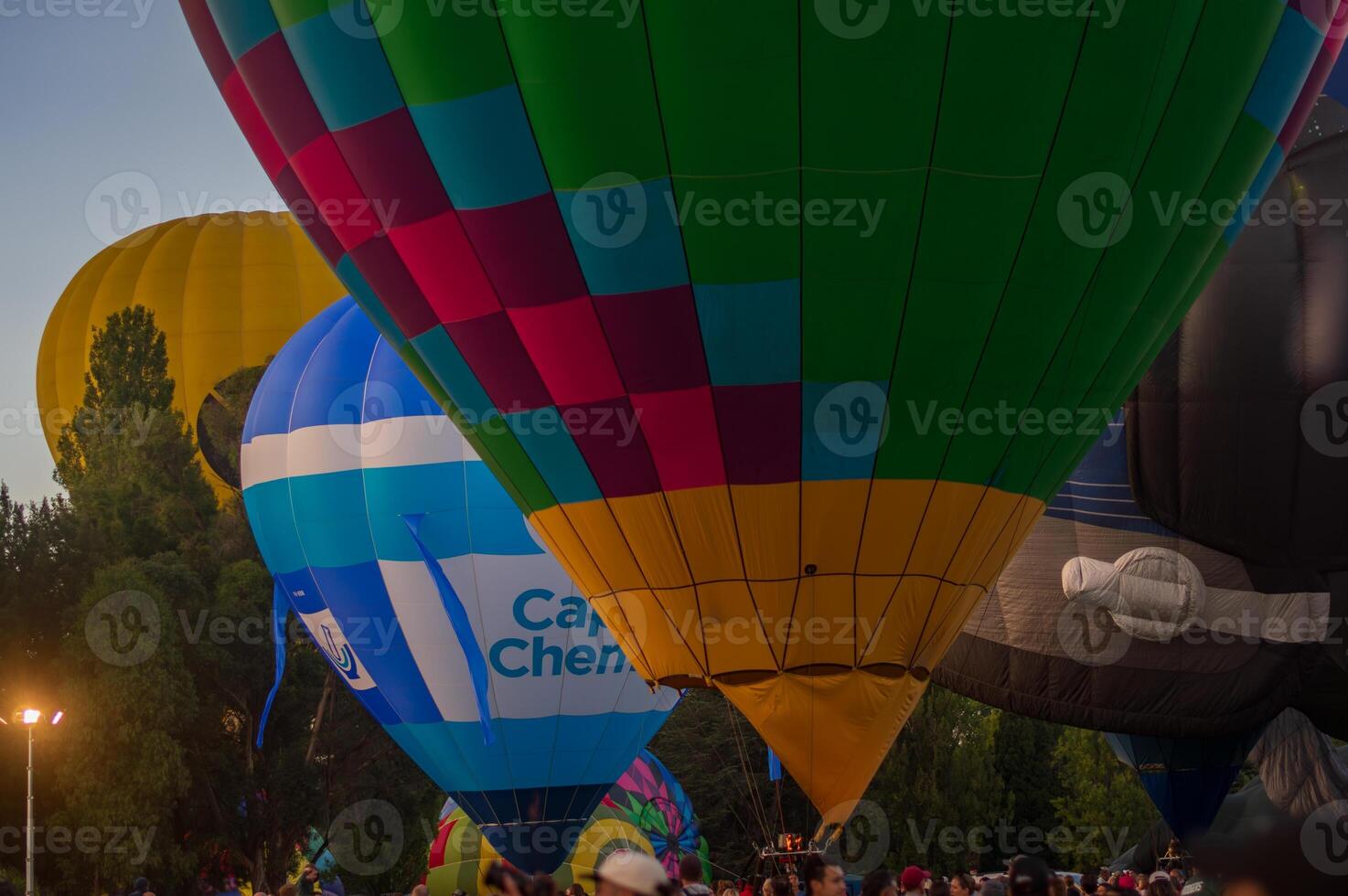 Dawn shot of inflated hot air balloons photo