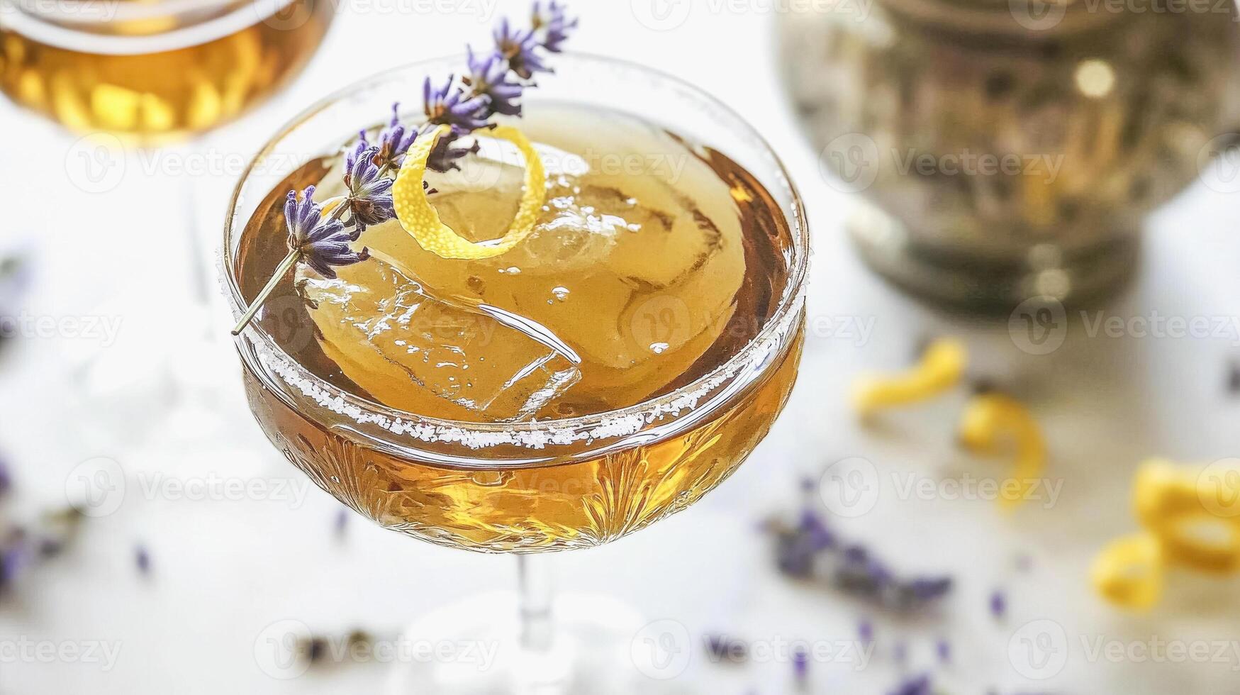 Earl grey tea infused cocktail with lavender and lemon garnish - elegant beverage presentation photo