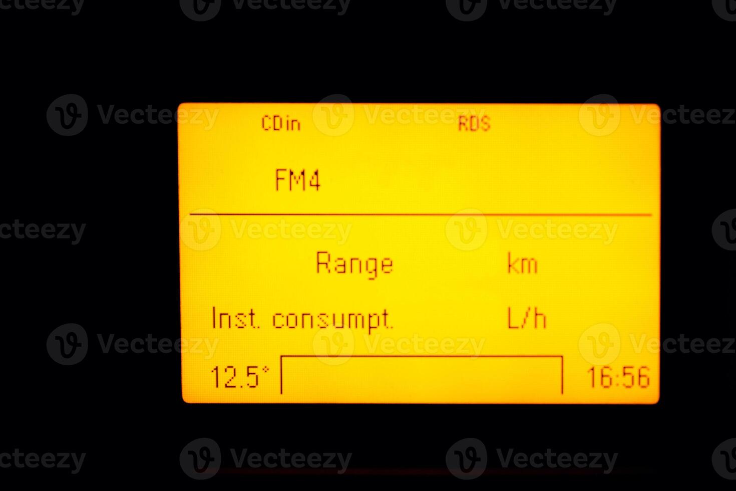 old car trip computer screen with radio and fuel consumption indicator photo