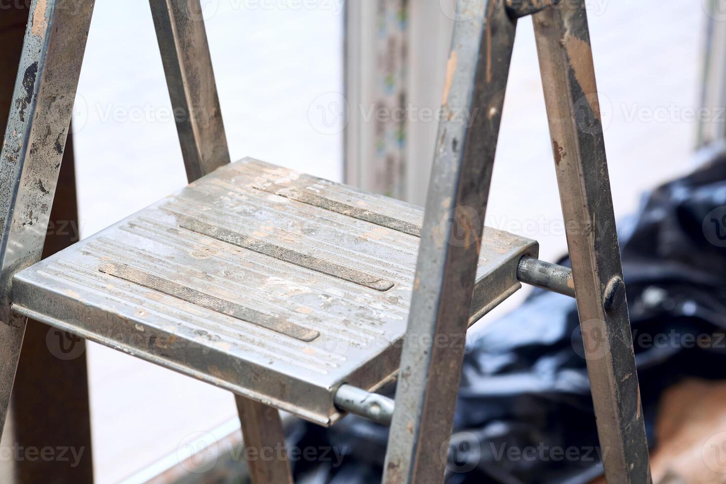 Upper crossbar of a folding stepladder for work, repair photo