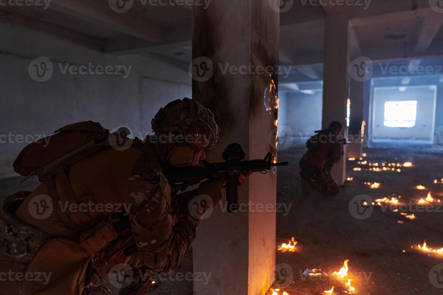 A group of professional soldiers bravely executes a dangerous rescue mission, surrounded by fire in a perilous building. photo