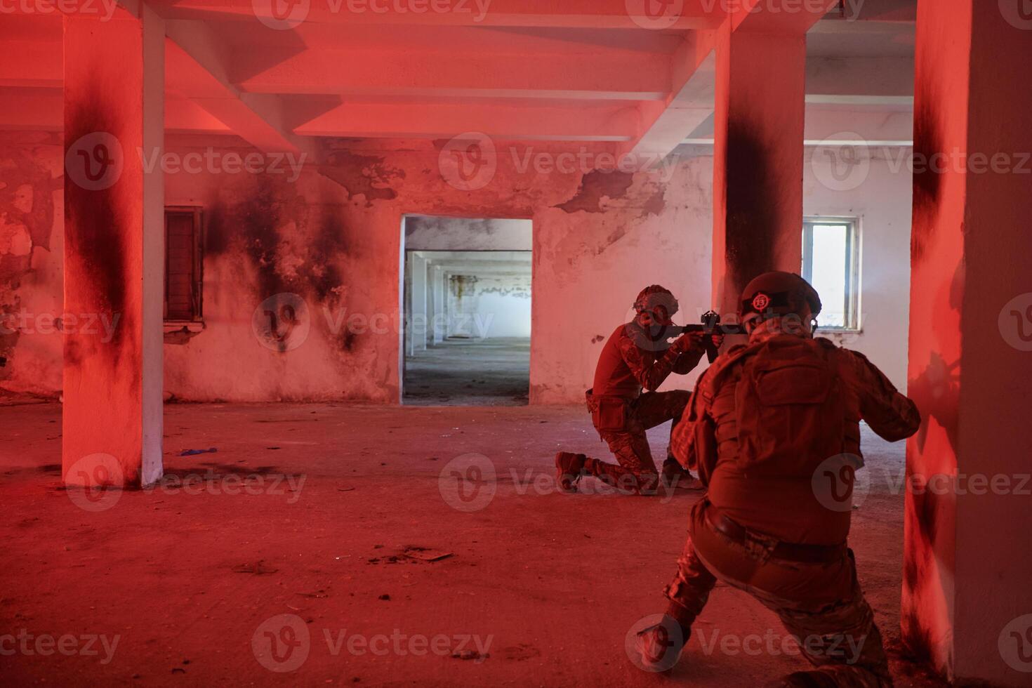 A group of professional soldiers bravely executes a dangerous rescue mission, surrounded by fire in a perilous building. photo