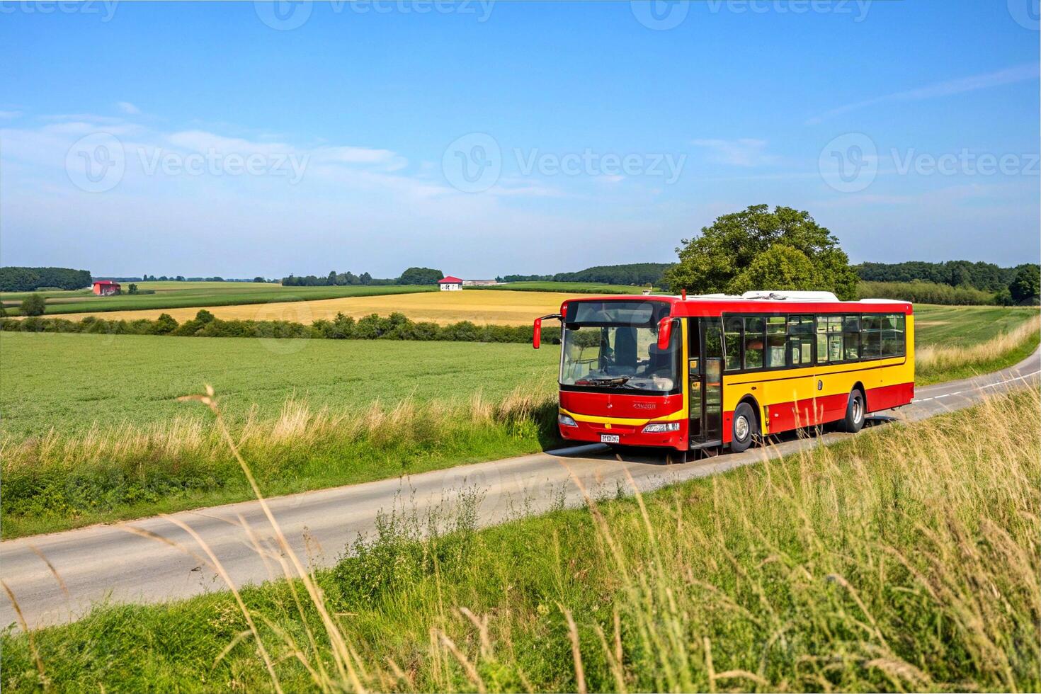 A regular intercity bus travels through a field along the route photo