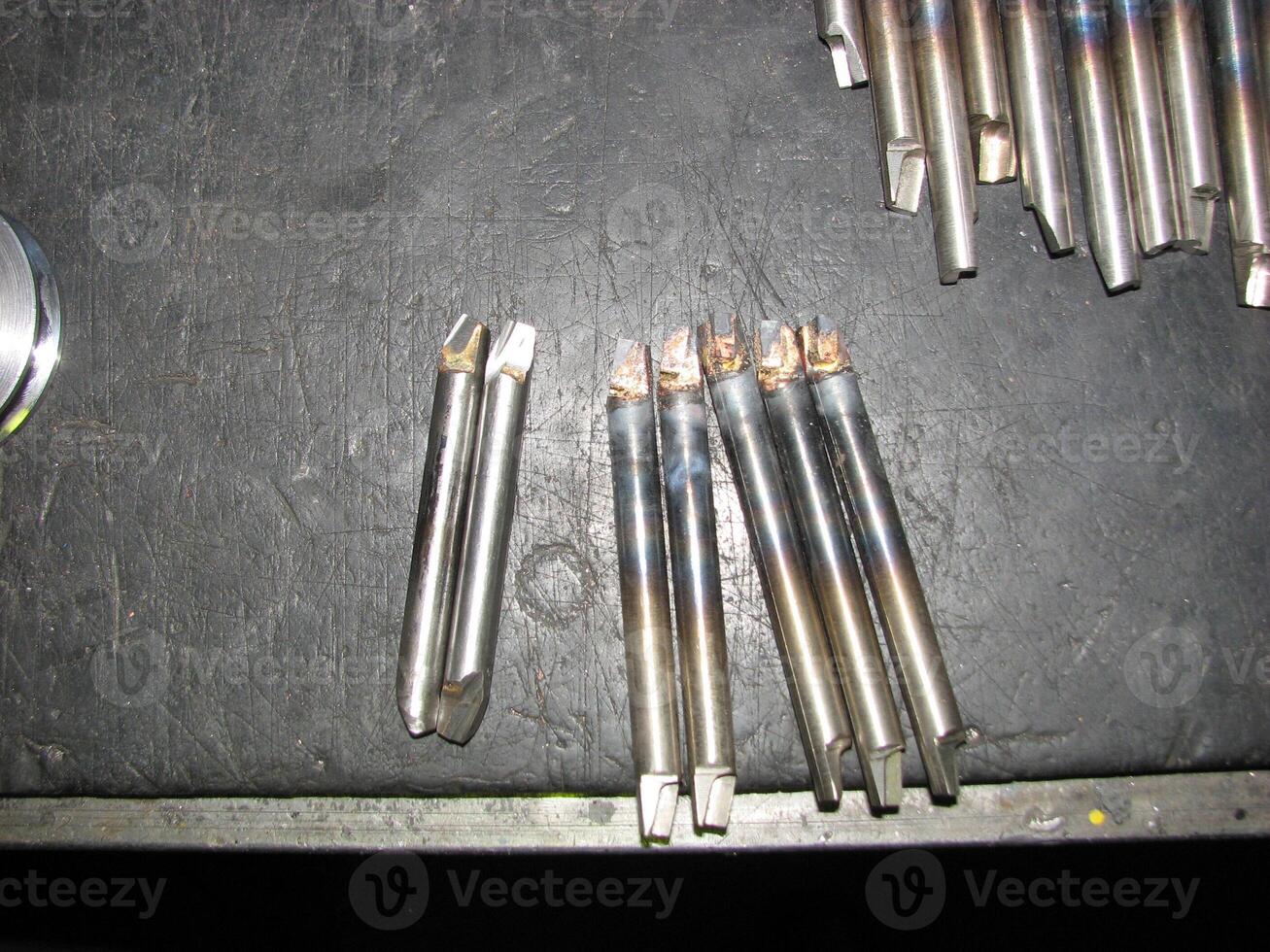 Lathe turning tools with carbide tips close-up, Metalworking tools. Industrial metalworking tools. Designed to work on a screw-cutting lathe. photo