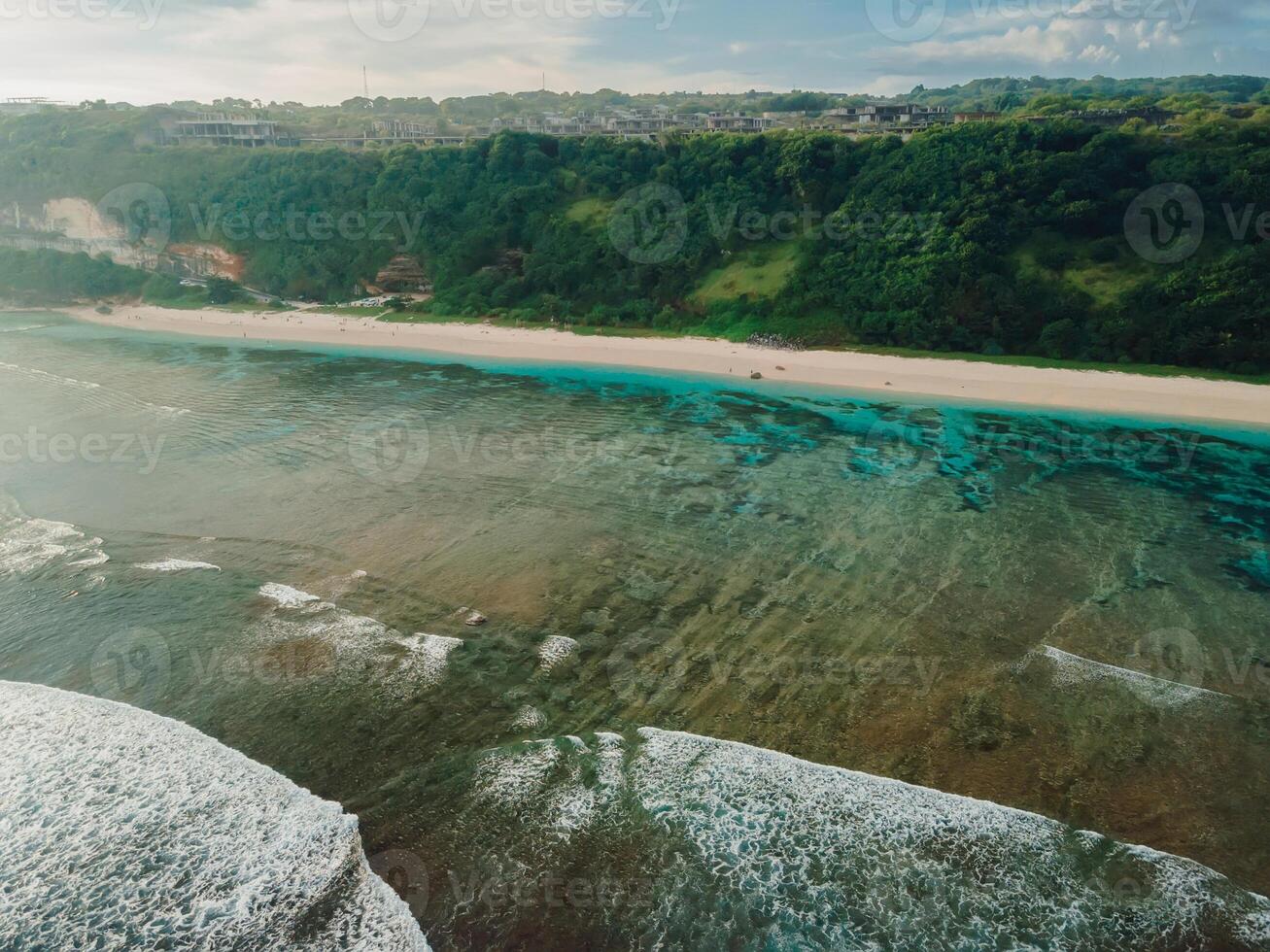 Coastline with cliffs and ocean in Bali. Aerial view of Pandawa photo