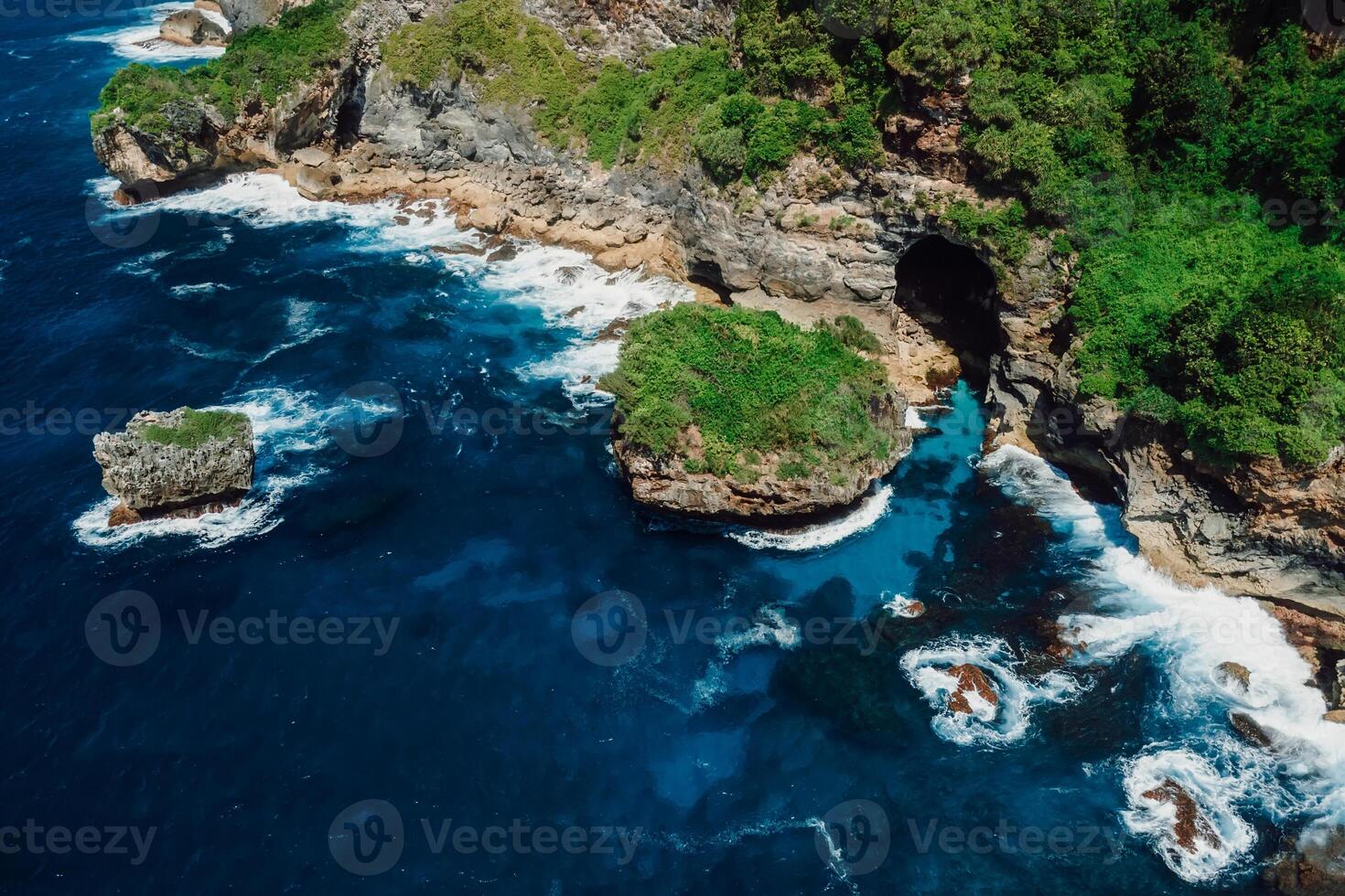 Landscape with rocks, hight cliff on coastline with blue ocean. Aerial view photo