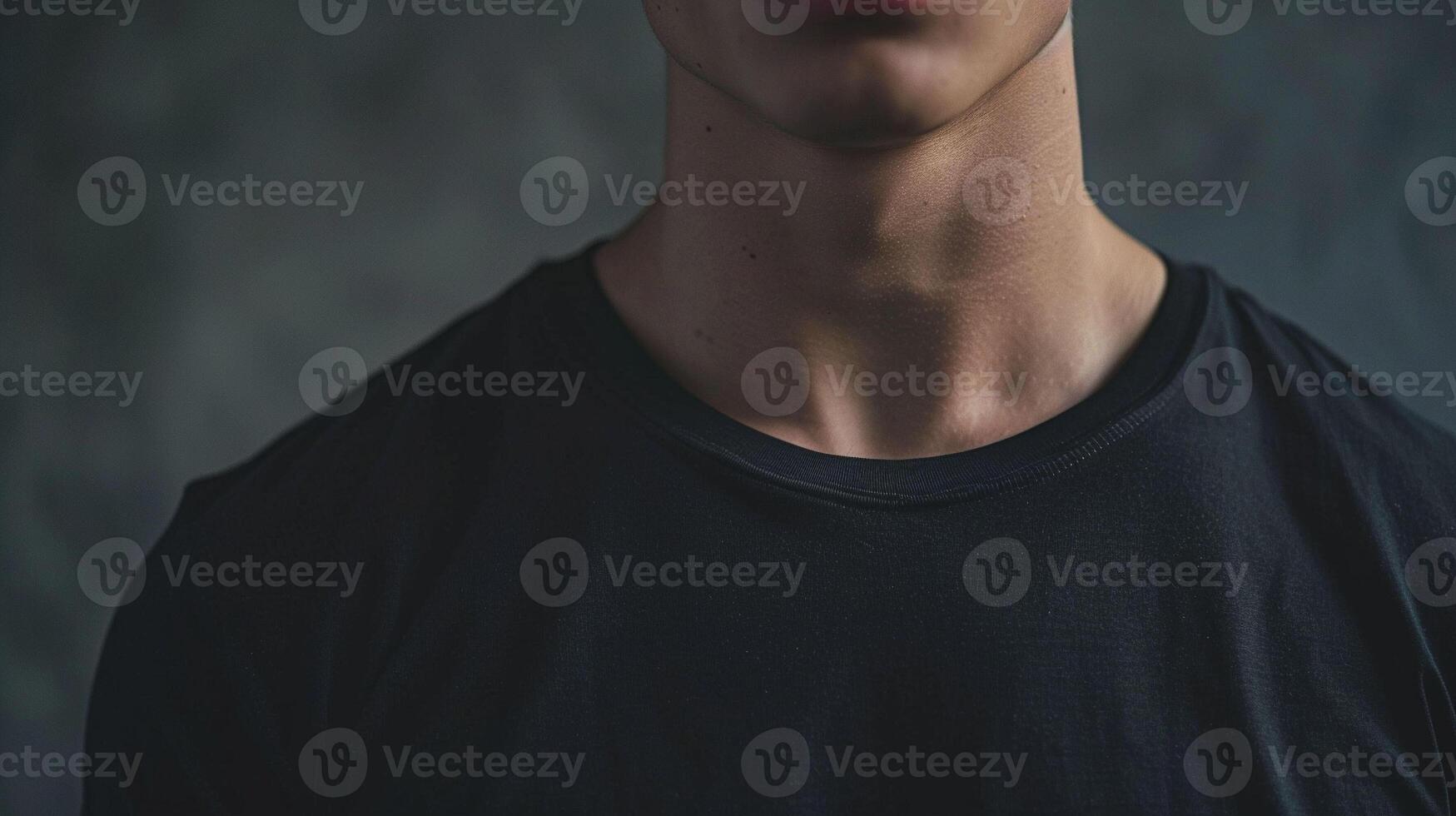A man in a black shirt with his eyes closed photo