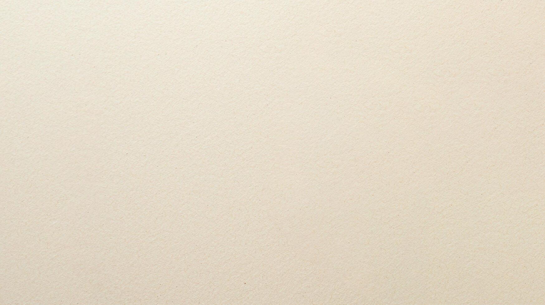 Textured Beige Paper Background Surface with subtle natural patterns and a soft neutral tone perfect for design, print, or stationery projects. photo