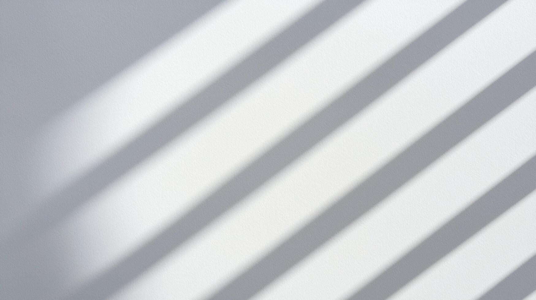 Diagonal Sunlight Shadows on White Wall creating a minimalist and calming pattern with soft gradients and subtle textures. photo