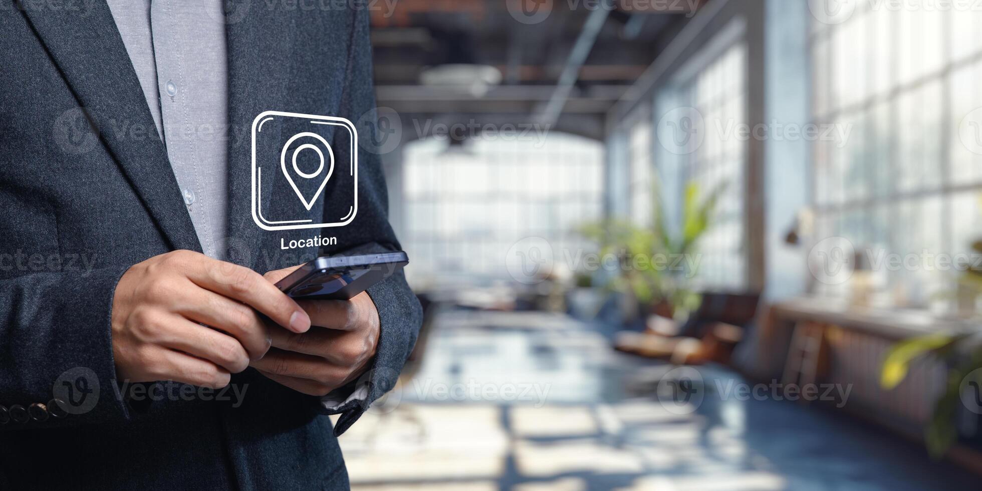 Business Person Using Smartphone with Location Icon in Office Space photo