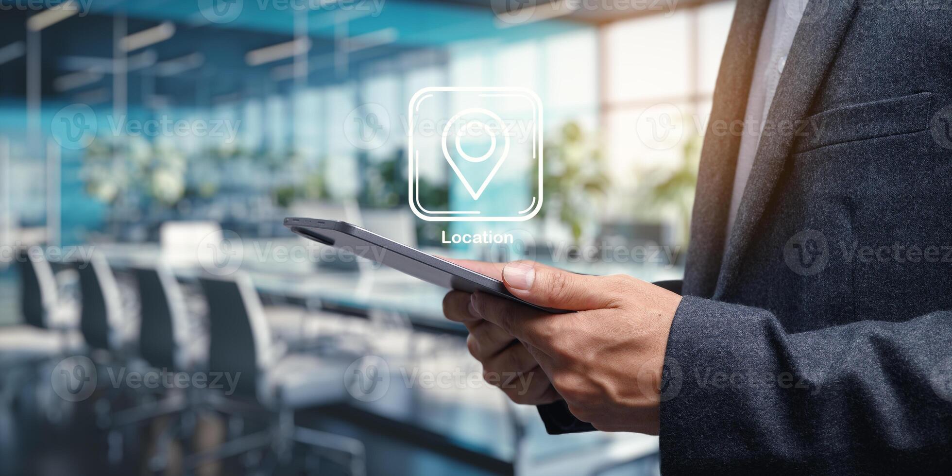 Business Professional Pinning Location Icon on Tablet in Modern Office photo