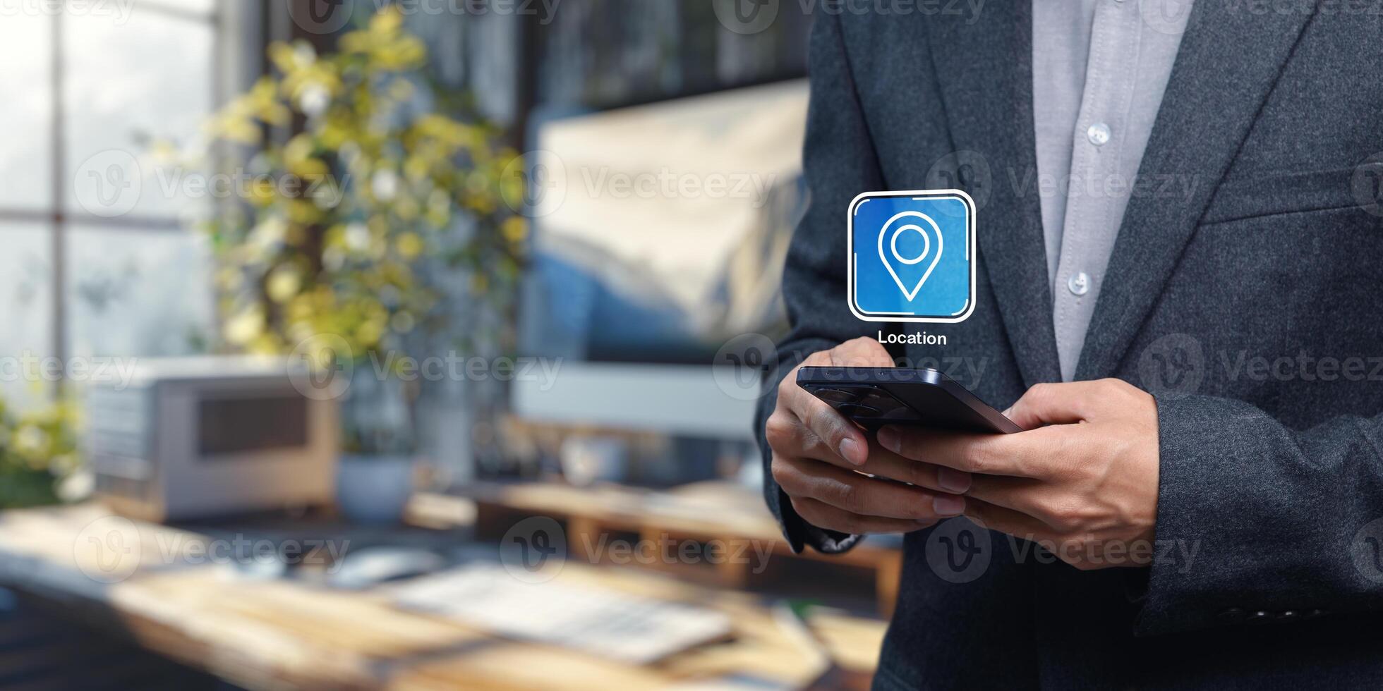 Modern Businessman Using Smartphone to Pin Location Icon in Office photo