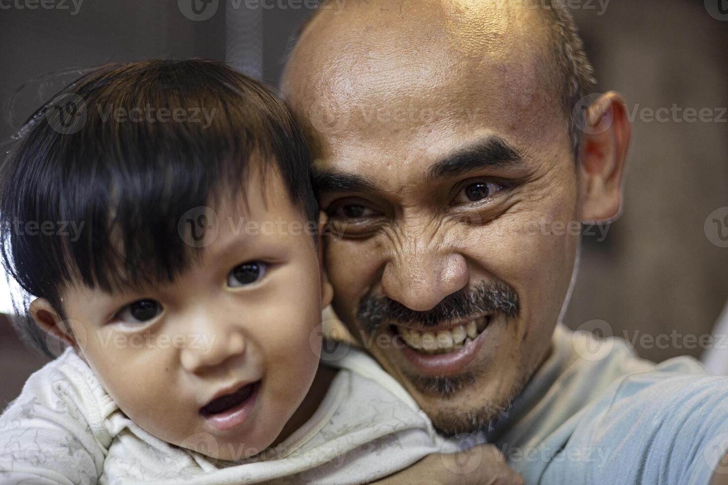 Father Teases His Little Child photo