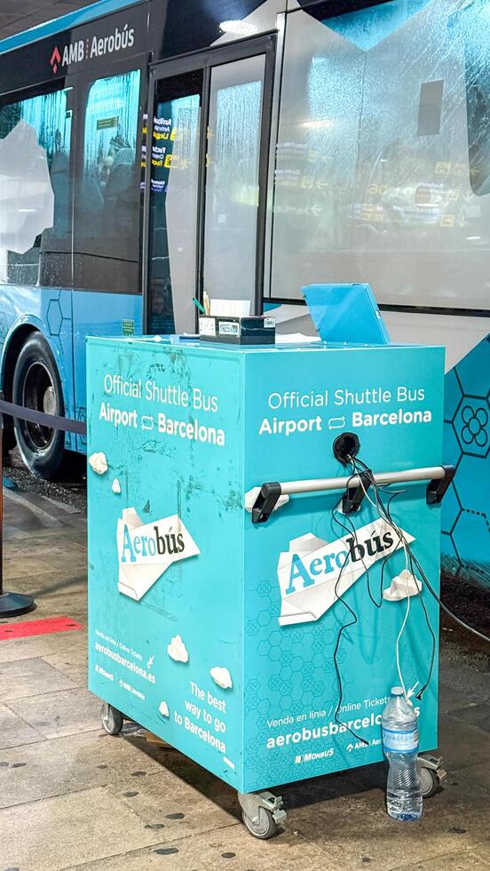 Official Barcelona Aerobus transportation service desk near a bus, travel logistics, airport shuttle March 16 2025, Barcelona, Spain photo